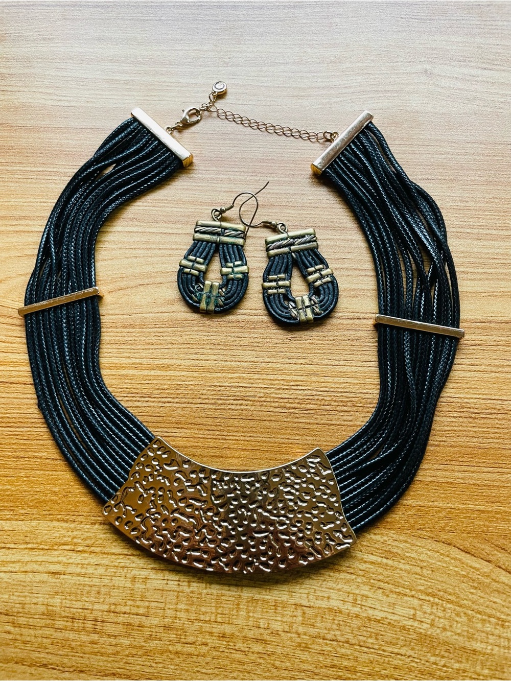 Black Multi-Strand Statement Necklace with Gold Accents and Matching Earrings